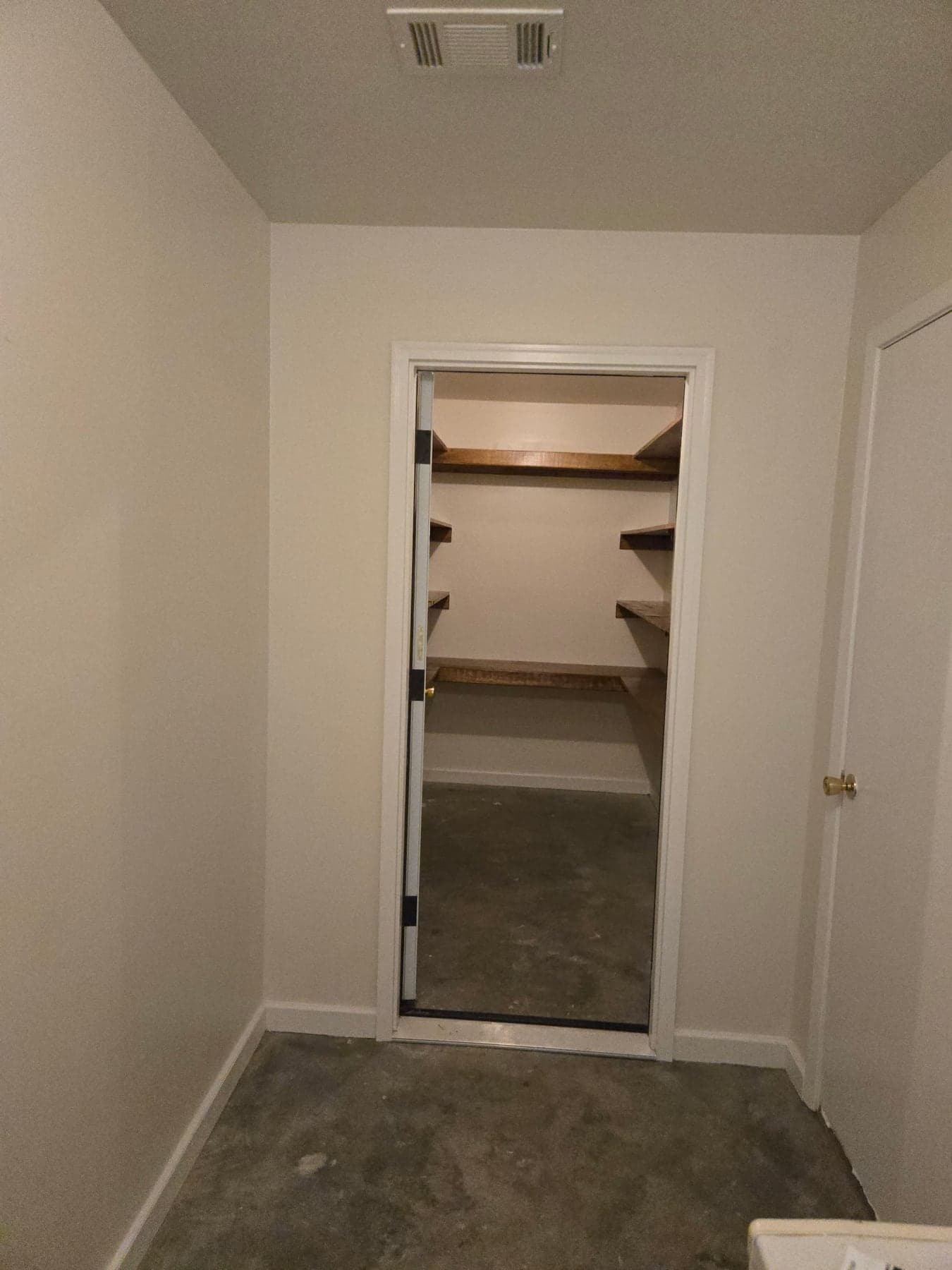 Completed custom closet with built-in shelving