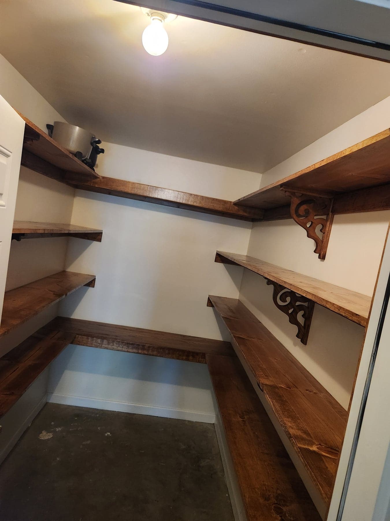 Custom closet shelving and drywall added during residential remodel