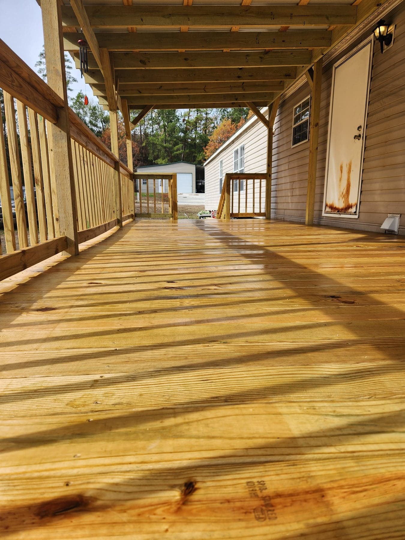 Covered porch after sealing with finished deck surface